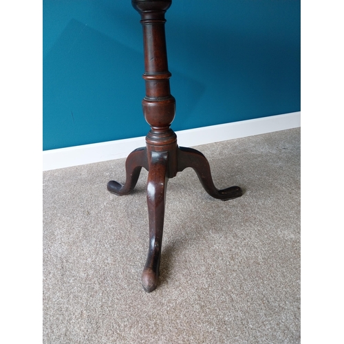 897 - Irish Georgian mahogany tilt top occasional table raised on turned column and three outswept feet {7... 