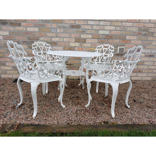 905 - Cast aluminium white garden table and four cast aluminium armchairs { Table 69cm H X 80cm Dia & Chai... 