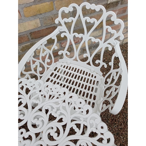 905 - Cast aluminium white garden table and four cast aluminium armchairs { Table 69cm H X 80cm Dia & Chai... 