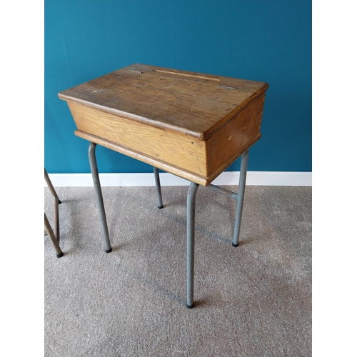 910 - Pair of 1950's oak school desks on metal tubular legs {80cm H x 53cm W x 44cm D}