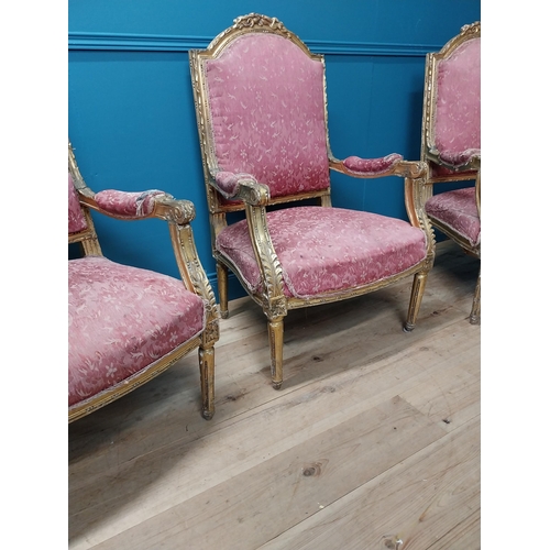 913 - Set of three French decorative giltwood and upholstered armchairs in the Louis XVI manner raised on ... 