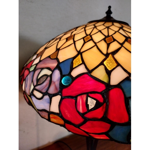 92 - Pair of metal and stained glass lamps in the Tiffany style {66 cm H x 44 cm Dia.}.