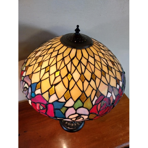 92 - Pair of metal and stained glass lamps in the Tiffany style {66 cm H x 44 cm Dia.}.