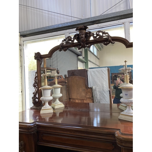 921 - 19th C. heavily carved mahogany sideboard with mirrored back and pheasant decoration {240 cm H 230 c... 