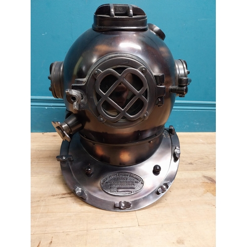 94 - Copperized metal Diver's helmet. {40 cm H x 40 cm W x 40 cm D}.