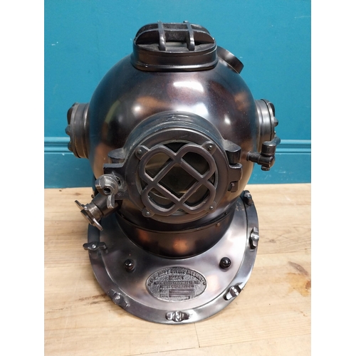 94 - Copperized metal Diver's helmet. {40 cm H x 40 cm W x 40 cm D}.