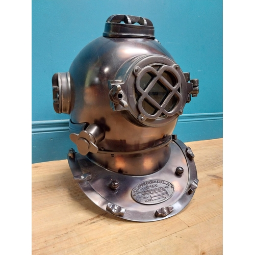 94 - Copperized metal Diver's helmet. {40 cm H x 40 cm W x 40 cm D}.