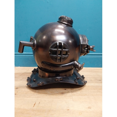 94 - Copperized metal Diver's helmet. {40 cm H x 40 cm W x 40 cm D}.