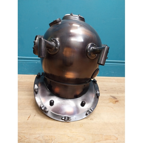 94 - Copperized metal Diver's helmet. {40 cm H x 40 cm W x 40 cm D}.