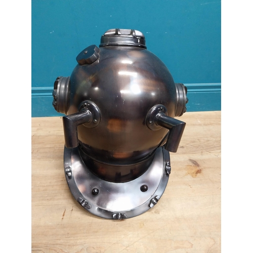 94 - Copperized metal Diver's helmet. {40 cm H x 40 cm W x 40 cm D}.