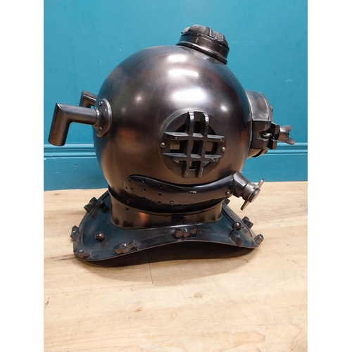 94 - Copperized metal Diver's helmet. {40 cm H x 40 cm W x 40 cm D}.