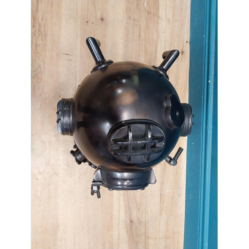 94 - Copperized metal Diver's helmet. {40 cm H x 40 cm W x 40 cm D}.