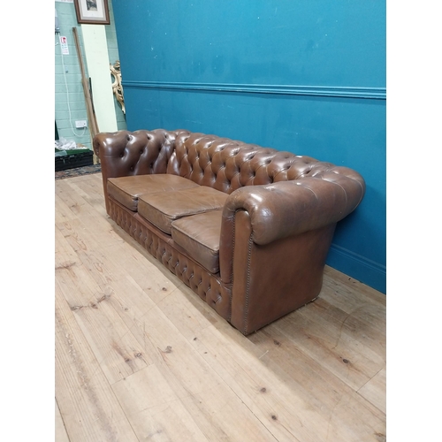 98 - Good quality leather deep buttoned Chesterfield three seater sofa {70 cm H x 190 cm W x 87 cm D}.