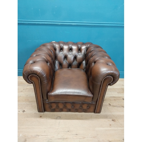 99 - Good quality leather deep buttoned Chesterfield club chair {73 cm H x 93 cm W x 90 cm D}.