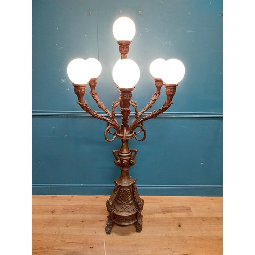 103 - Pair of decorative bronze floor candelabras with opaline glass shades {174 cm H x 75 cm Dia.}.