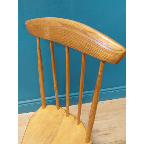 107 - 1950s pine childs chair raised on three tapered legs {74 cm H x 34 cm W x 37 cm D}.