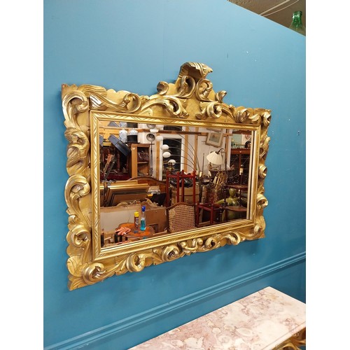 108 - Highly carved Gilt console table with marble top and matching mirror in the Rococo style. {87 cm H x... 