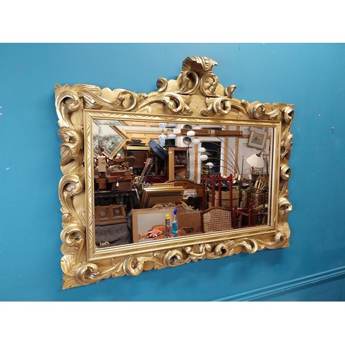 108 - Highly carved Gilt console table with marble top and matching mirror in the Rococo style. {87 cm H x... 