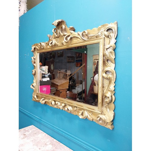 108 - Highly carved Gilt console table with marble top and matching mirror in the Rococo style. {87 cm H x... 