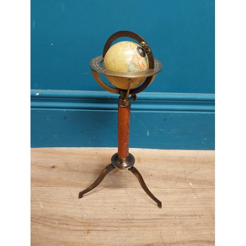 110 - Brass and leather desk globe on tripod stand. {30 cm H x 15 cm Dia.}.