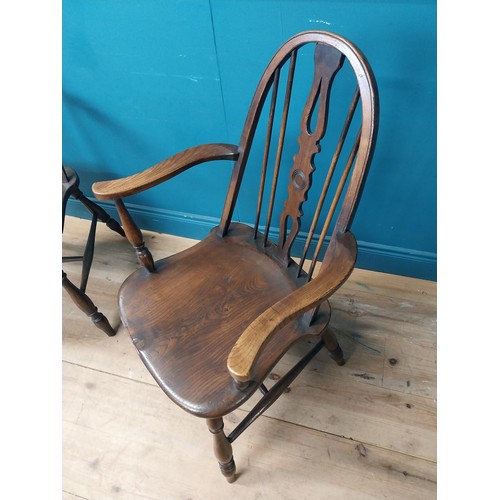 115 - Pair of ash and elm Windsor arm chairs {100 cm H x 60 cm W x 60 cm D}.