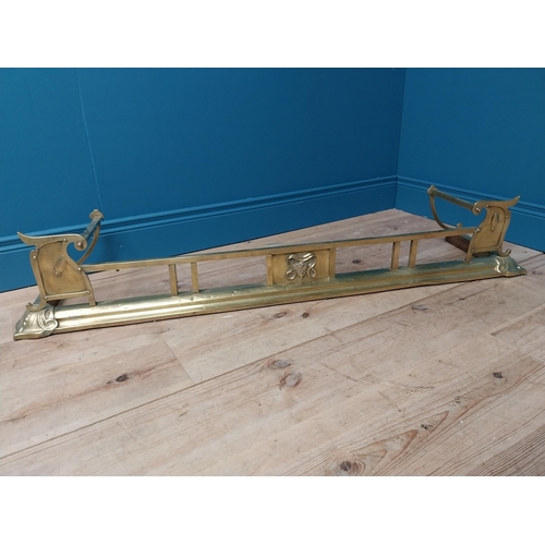 57A - Art Nouveau brass fire fender. { 26 cm H x 125 cm W x 31 cm D}.