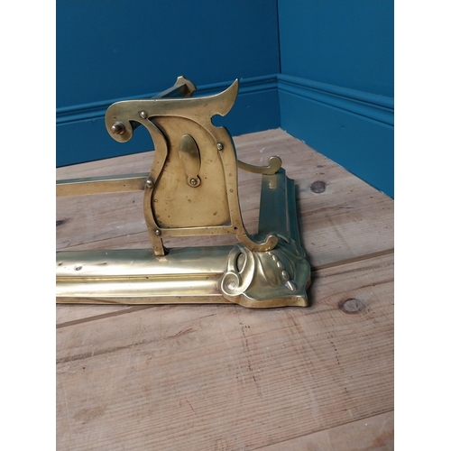 57A - Art Nouveau brass fire fender. { 26 cm H x 125 cm W x 31 cm D}.