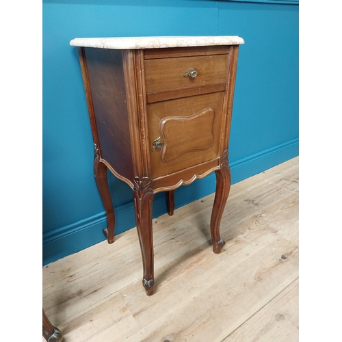 935 - Pair of 19th C. mahogany bedside cabinets with single drawer above panel door and marble tops raised... 