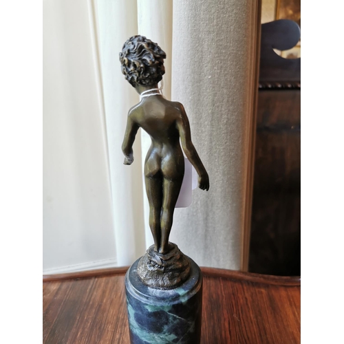 947 - Bronze model of a Young Boy mounted on marble base {33 cm H x 8 cm W}.