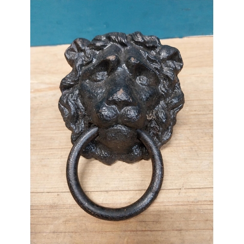 950 - 19th C. cast iron lion's mask door knocker. {20 cm H x 13 cm W x 7 cm D}.