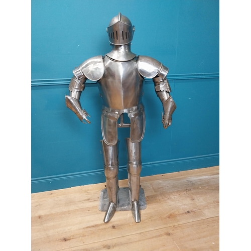 954 - Metal Suit of Armour. {140 cm H x 75 cm W x 46 cm D}.