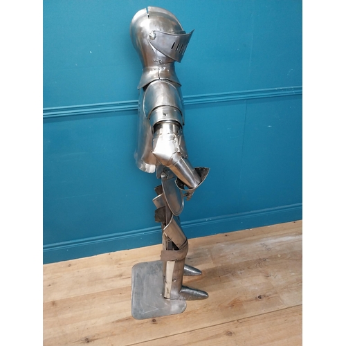 954 - Metal Suit of Armour. {140 cm H x 75 cm W x 46 cm D}.