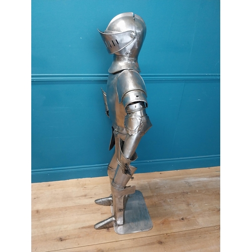 954 - Metal Suit of Armour. {140 cm H x 75 cm W x 46 cm D}.