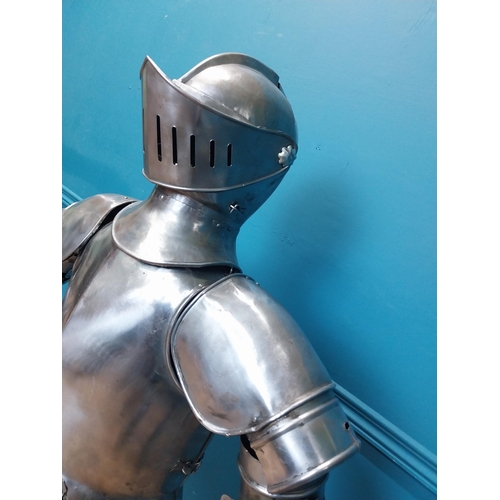 954 - Metal Suit of Armour. {140 cm H x 75 cm W x 46 cm D}.