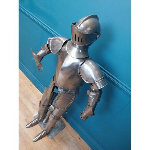 954 - Metal Suit of Armour. {140 cm H x 75 cm W x 46 cm D}.