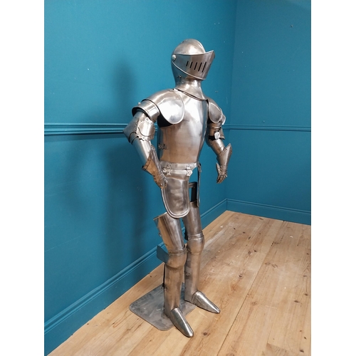 954 - Metal Suit of Armour. {140 cm H x 75 cm W x 46 cm D}.