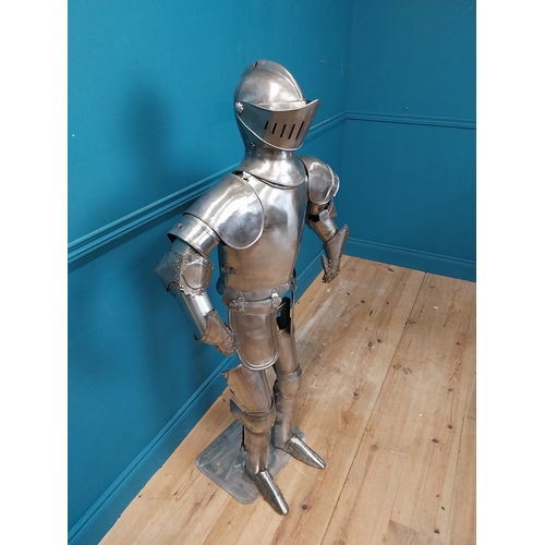 954 - Metal Suit of Armour. {140 cm H x 75 cm W x 46 cm D}.