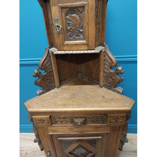 960 - 19th. C. carved oak corner cupboard with two blind doors and single drawer in the frieze {170 cm H x... 