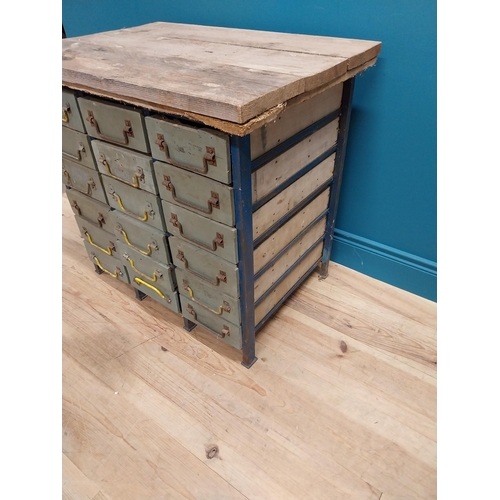 961 - 1950's painted pine and metal bank of eighteen drawers with original wrought iron handles. {76 cm H ... 