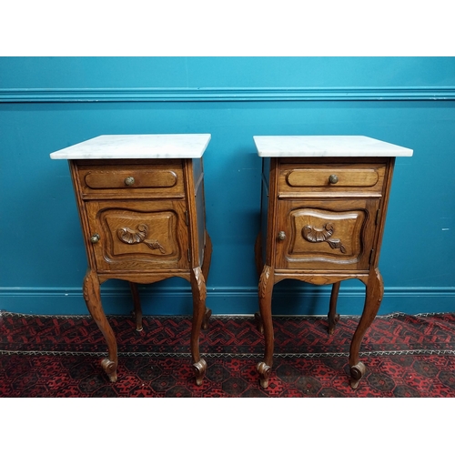 972 - Pair of 19th C. oak bedside lockers with marble tops. {84 cm H x 41 cm W x 41 cm D}.