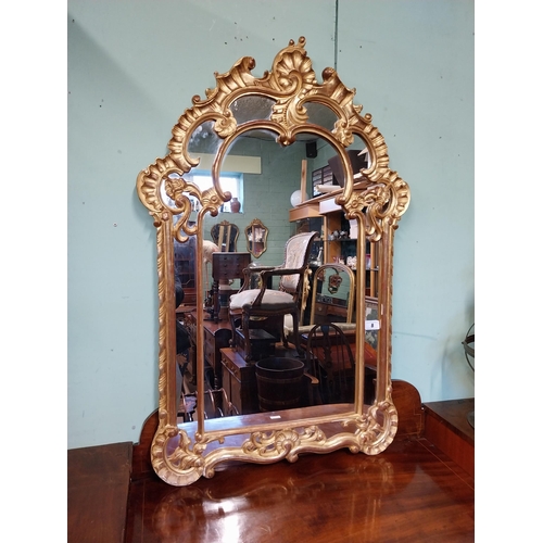 8 - Good quality decorative 20th. C. gilt wall mirror in the Italian style. { 117cm H X 76cm W }.