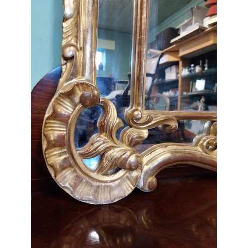 8 - Good quality decorative 20th. C. gilt wall mirror in the Italian style. { 117cm H X 76cm W }.