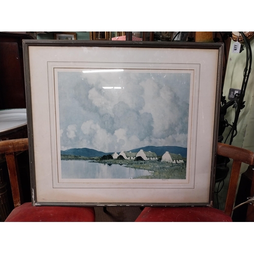 939 - Paul Henry coloured print Rural Scene mounted in a wooden frame. { 71cm H X 81cm W }.