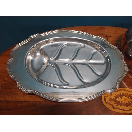 943 - Silver plate meat platter and silver plate meat dish cover. {5 cm H x 45 cm W x 32 cm D}.