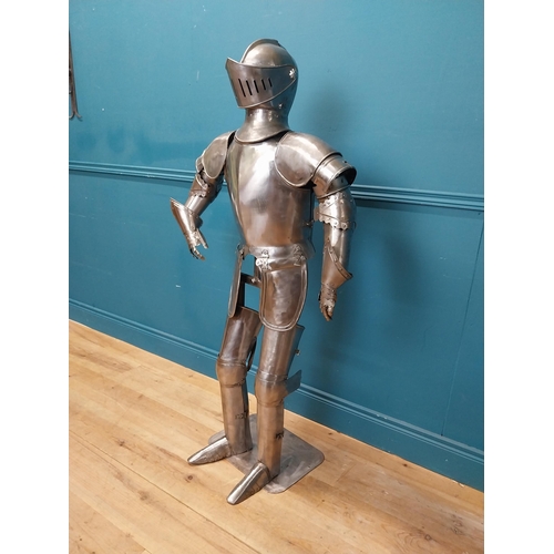 954 - Metal Suit of Armour. {140 cm H x 75 cm W x 46 cm D}.