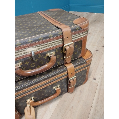 959 - Two exceptional quality 1950's Louis Vuitton Paris made in France leather suitcases. {23 cm H x 69 c... 