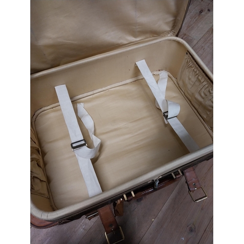 959 - Two exceptional quality 1950's Louis Vuitton Paris made in France leather suitcases. {23 cm H x 69 c... 