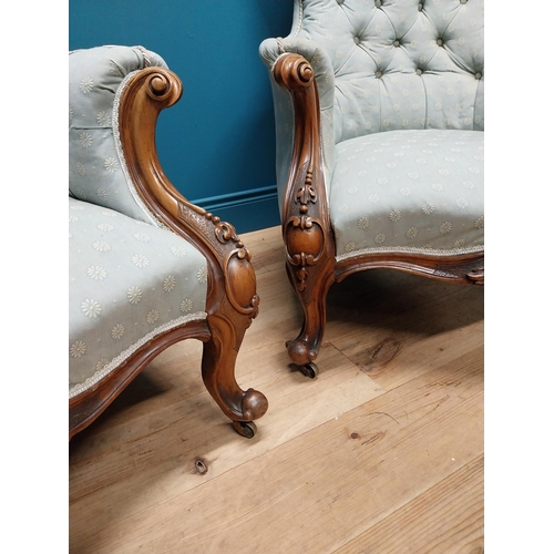 962 - Pair of mahogany and upholstered armchairs raised on cabriole legs {102 cm H x 78 cm W x 83 cm D}.