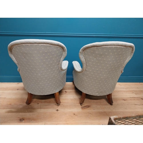 962 - Pair of mahogany and upholstered armchairs raised on cabriole legs {102 cm H x 78 cm W x 83 cm D}.