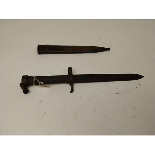 100 - 20th C. rifle bayonet with original metal scabbard. {36 cm  L}.